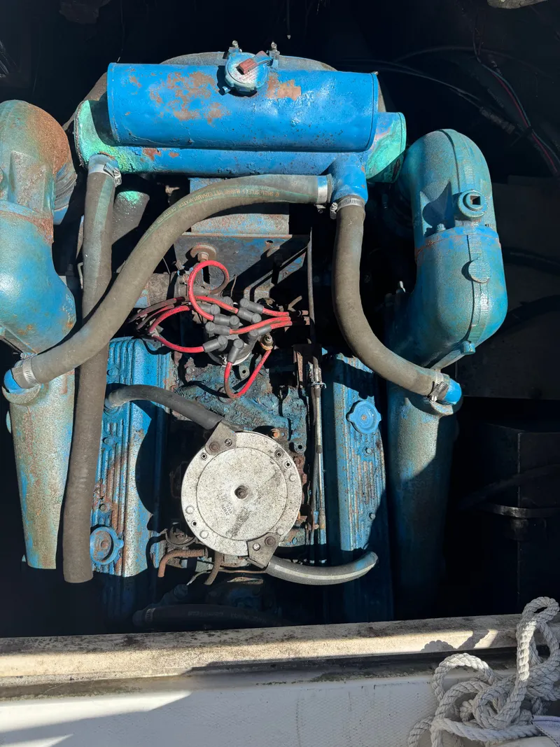 Slide: The Image of Engine compartment of a 1987 Phoenix 29 Convertible boat. - 9
