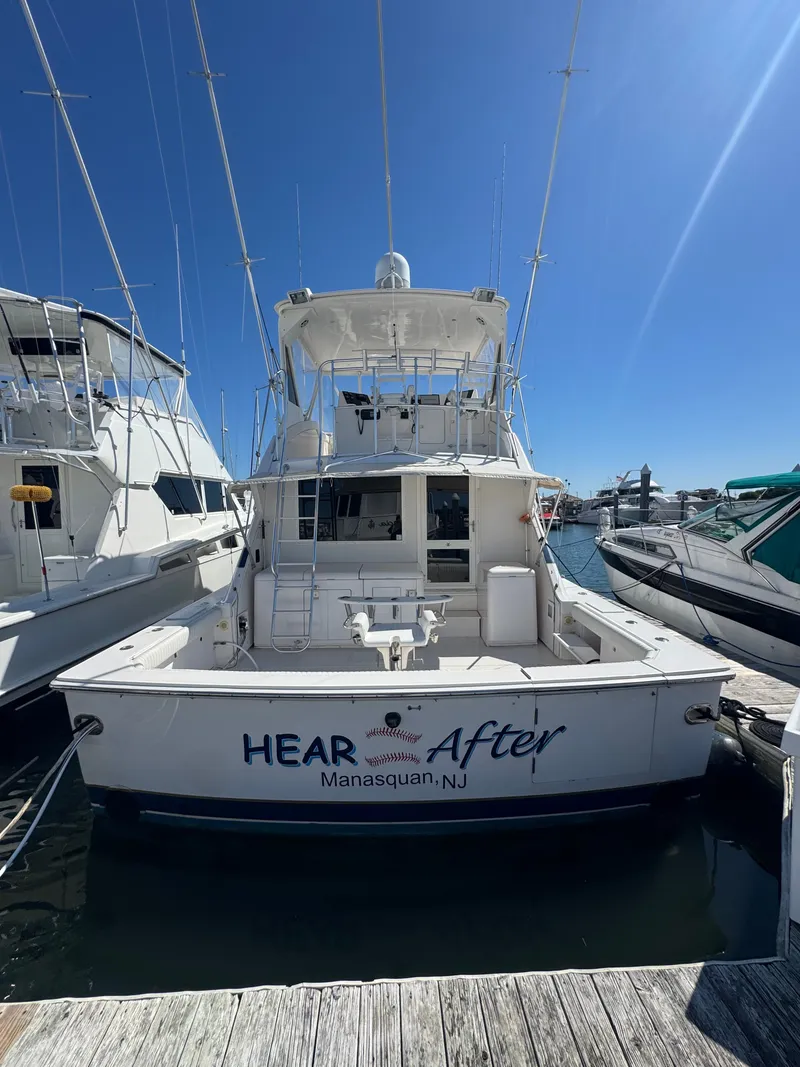 Slide: The Image of 1995 Bertram 50 Convertible yacht docked in Manasquan, NJ marina. - 3