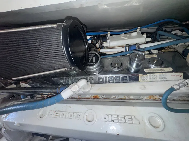 Slide: The Image of Engine compartment of a 1995 Bertram 50 Convertible with Detroit Diesel components. - 40