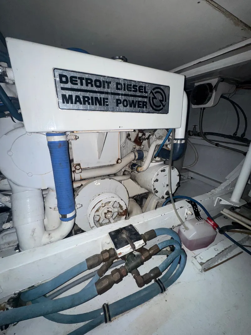 Slide: The Image of Engine room of 1995 Bertram 50 Convertible with Detroit Diesel Marine Power. - 42