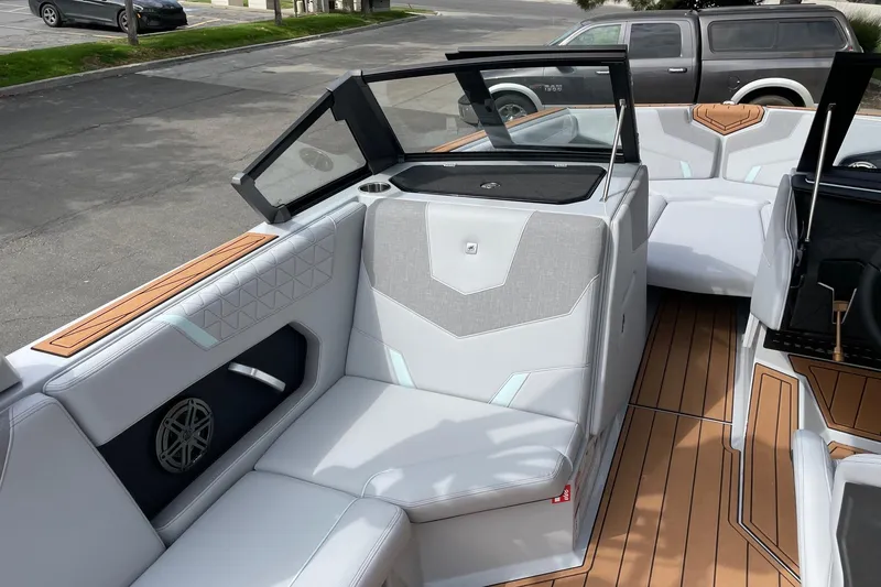 Slide: The Image of 2026 Nautique Super Air Nautique GS24 interior with sleek seating and modern design. - 10