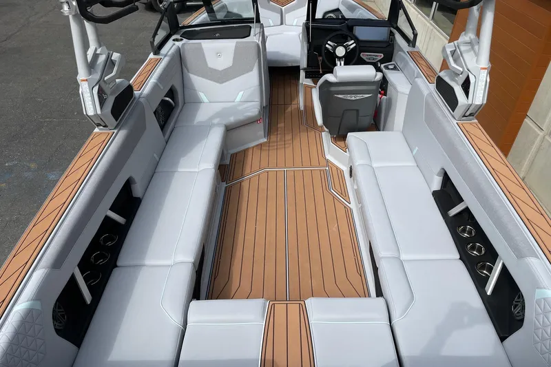 Slide: The Image of 2026 Nautique Super Air Nautique GS24 interior with sleek seating and modern design. - 5