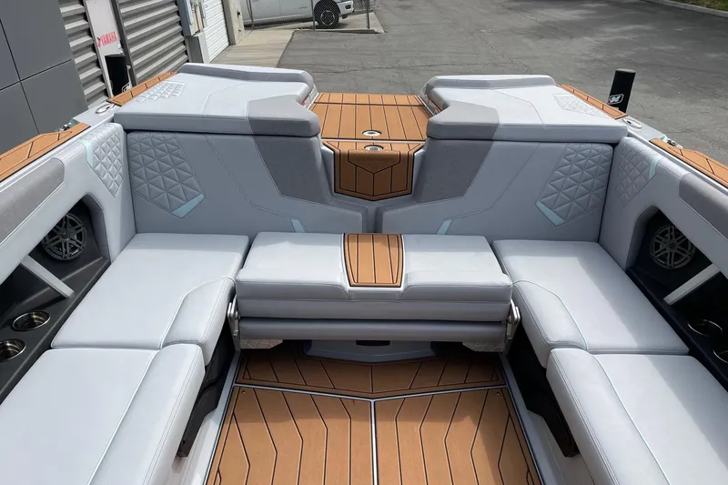 Slide: The Image of 2026 Nautique Super Air Nautique GS24 interior with luxurious seating and modern design. - 8