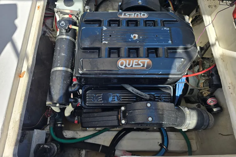 Slide: The Image of Engine compartment of a 1984 Bayliner 2802 Trophy boat with Quest engine components. - 16