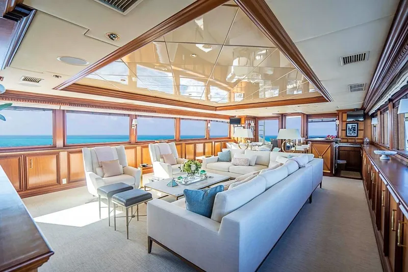 Slide: The Image of Luxurious interior of 2000 Broward Raised Pilothouse yacht with elegant seating and ocean views. - 2