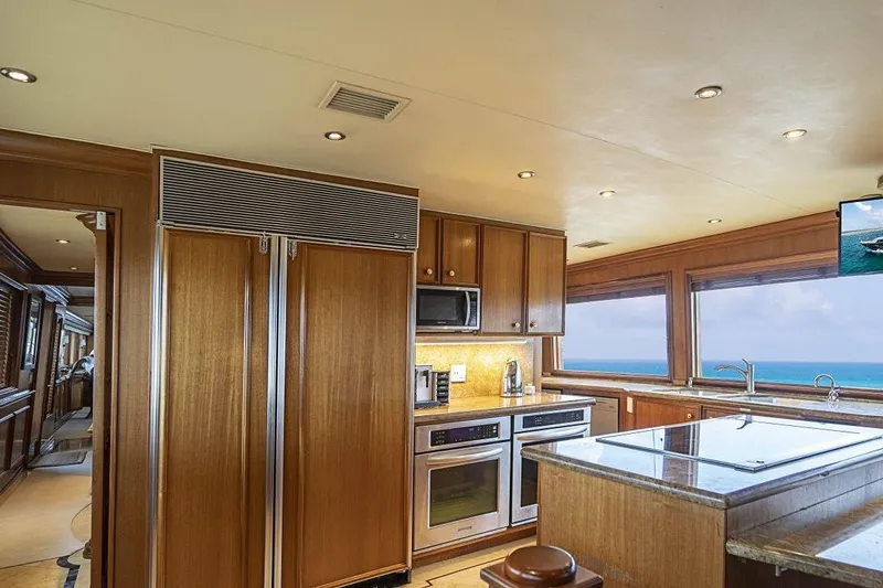 Slide: The Image of Luxurious kitchen interior of 2000 Broward Raised Pilothouse yacht with ocean view. - 7