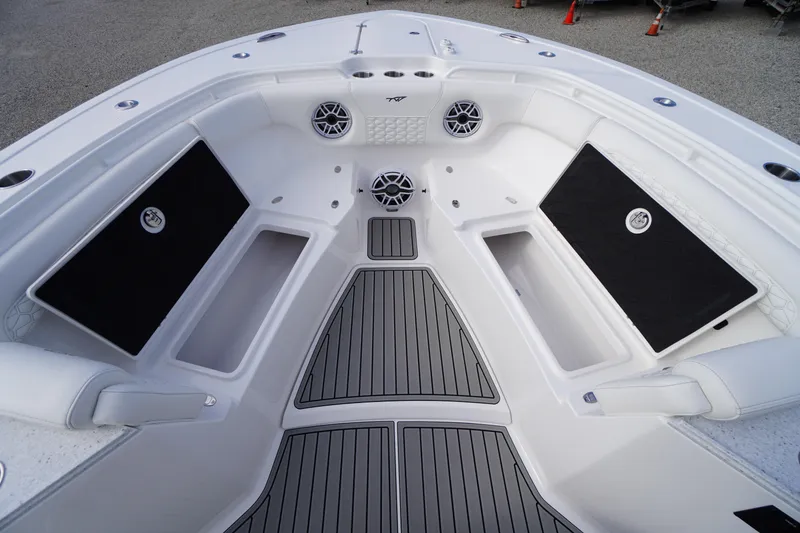 Slide: The Image of 2026 Tidewater 282 CC Adventure boat interior with sleek seating and modern design. - 17