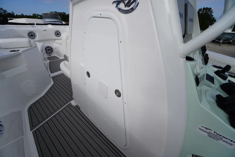Slide: The Image of 2026 Tidewater 282 CC Adventure boat interior with sleek design and modern features. - 23