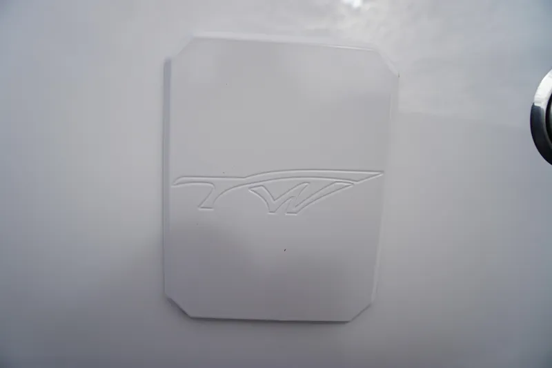 Slide: The Image of Embossed logo on 2026 Tidewater 282 CC Adventure boat surface. - 29