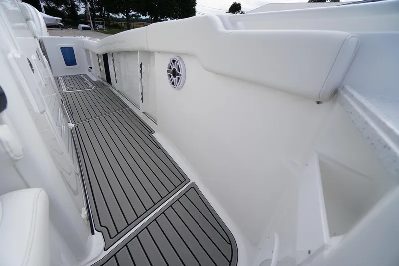 Slide: The Image of 2026 Tidewater 282 CC Adventure boat interior with sleek flooring and modern design. - 40