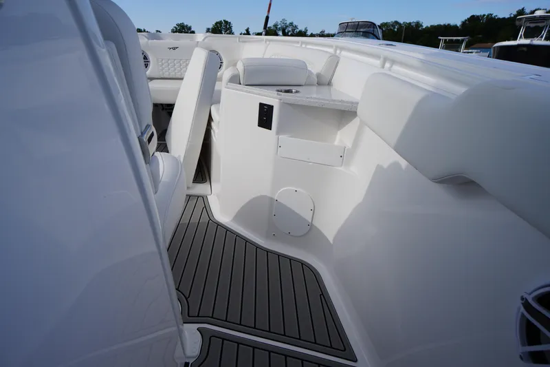 Slide: The Image of 2026 Tidewater 282 CC Adventure boat interior with sleek seating and modern design. - 55