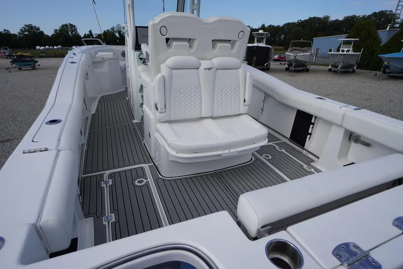 Slide: The Image of 2026 Tidewater 282 CC Adventure boat interior with sleek seating and modern design. - 80