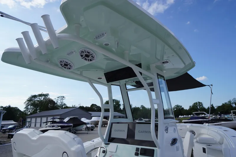 Slide: The Image of 2026 Tidewater 282 CC Adventure boat with advanced Garmin navigation system and sleek design. - 83