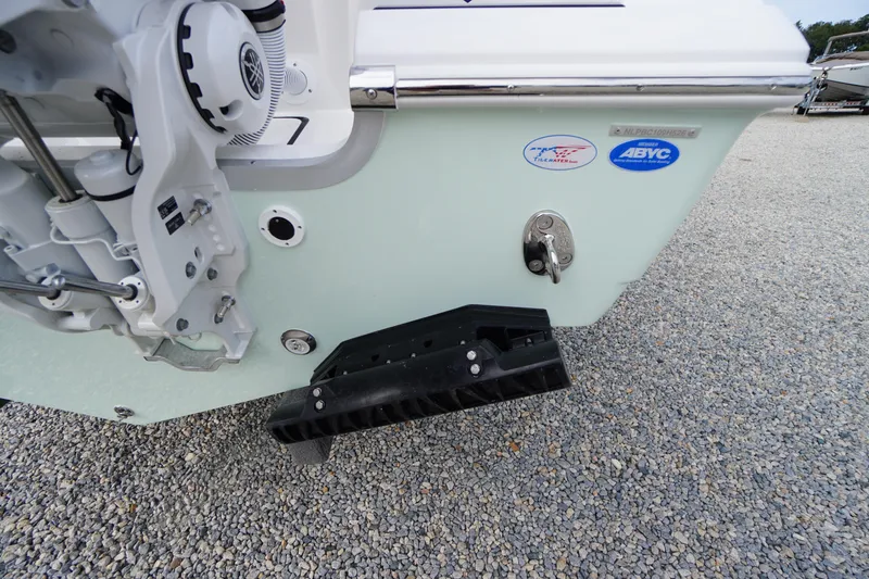 Slide: The Image of 2026 Tidewater 282 CC Adventure boat stern with motor and ABYC certification. - 95