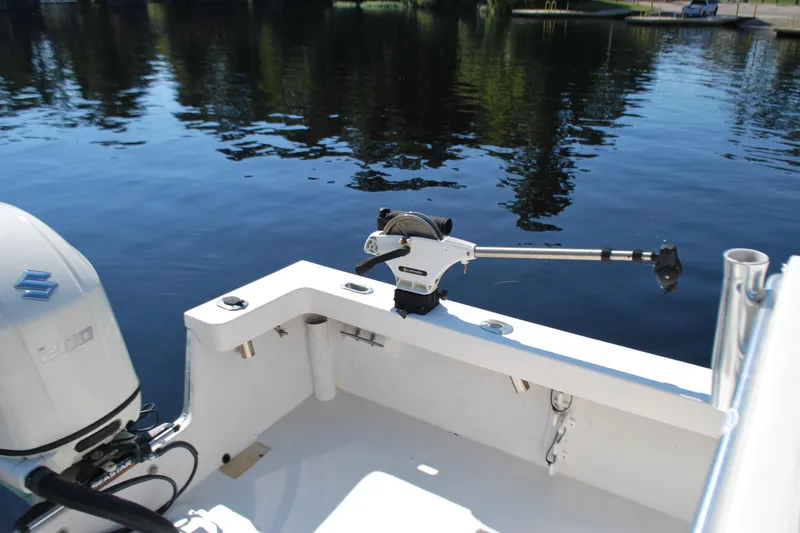 Slide: The Image of 2021 May-Craft 23 Cape Classic boat with Suzuki engine on calm water. - 11