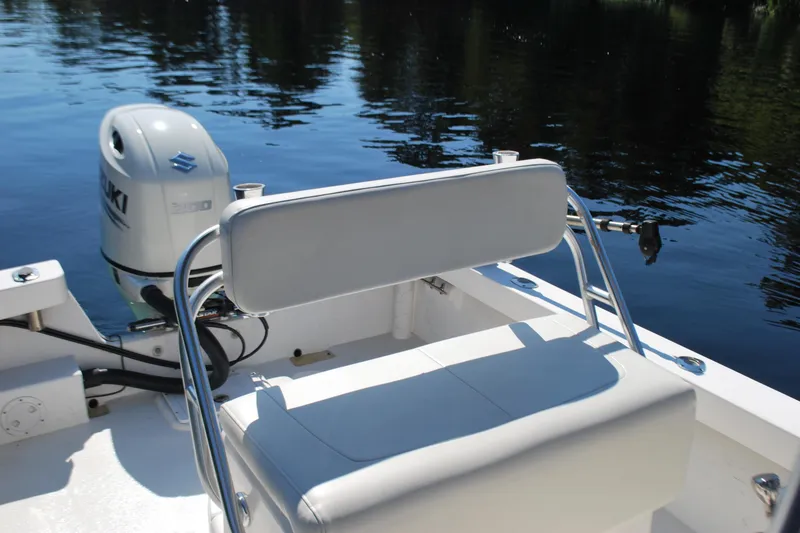 Slide: The Image of 2021 May-Craft 23 Cape Classic boat with Suzuki outboard motor on calm water. - 8