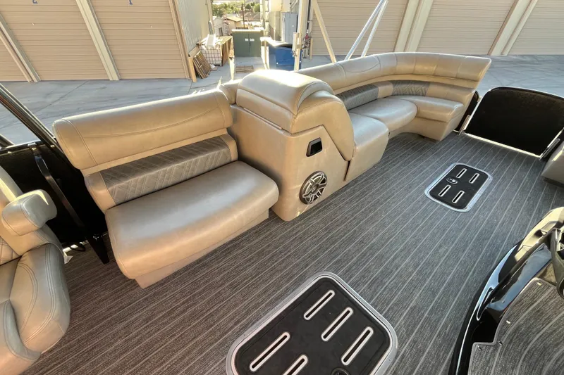 Slide: The Image of Luxurious seating on 2023 Premier 310 Boundary Waters Revolution Top Deck pontoon boat. - 12