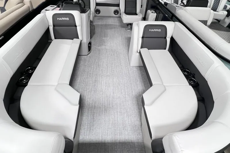 Slide: The Image of 2025 Harris Cruiser 230 Heritage Edition interior with luxurious seating and modern design. - 4