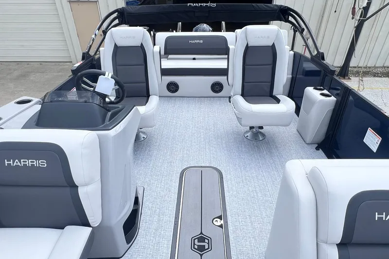 Slide: The Image of 2026 Harris Cruiser 230 interior with modern seating and sleek design. - 4