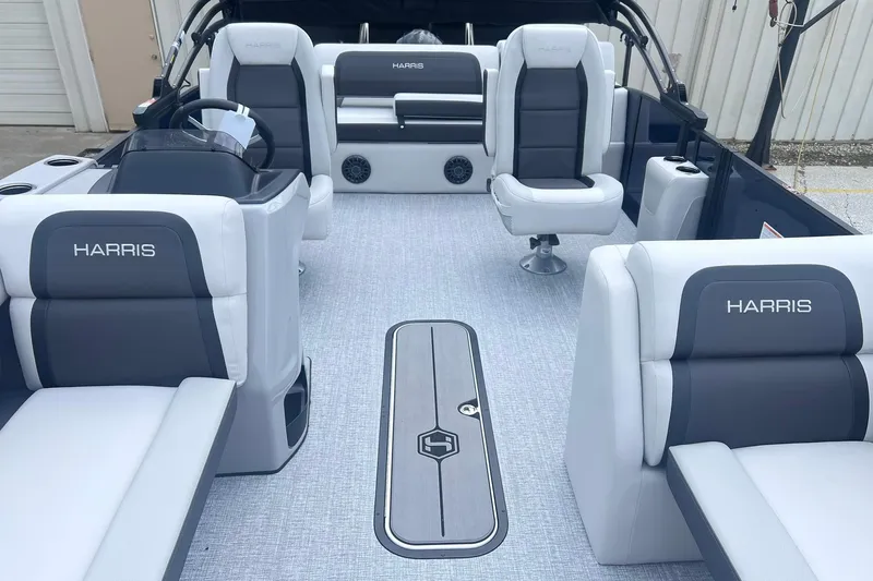 Slide: The Image of 2026 Harris Cruiser 230 boat interior with luxurious seating and modern design. - 8