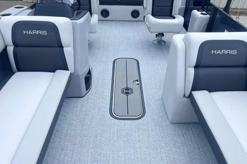 Slide: The Image of 2026 Harris Cruiser 230 interior with sleek seating and modern design. - 9