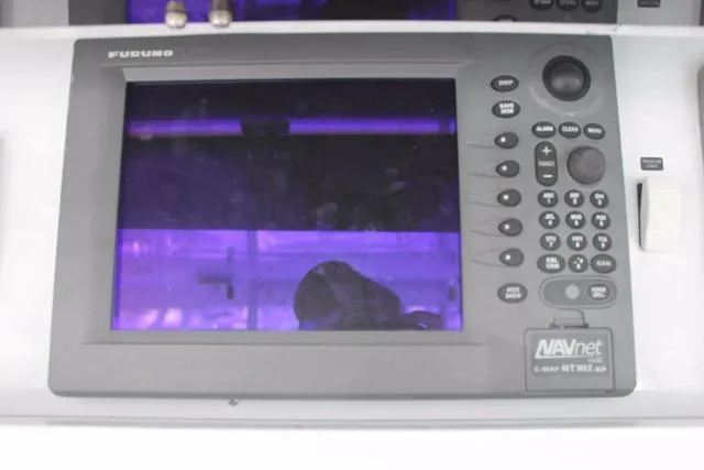 Slide: The Image of Furuno NAVnet marine GPS system on 2005 DeSanti Carolina Express boat dashboard. - 32