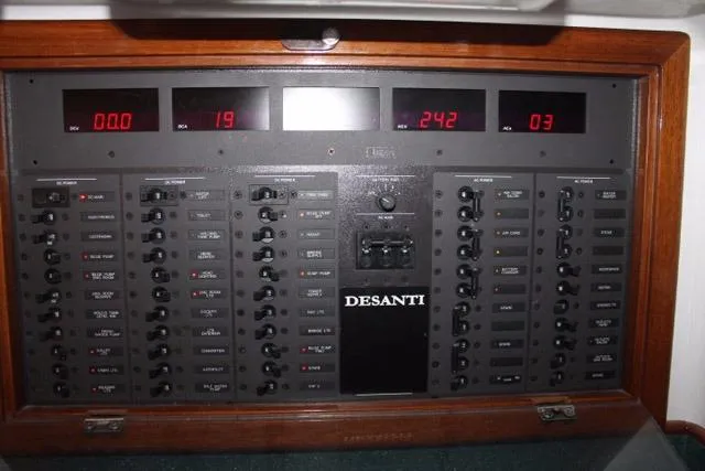 Slide: The Image of Electrical control panel of 2005 Custom DeSanti Carolina Express boat. - 36