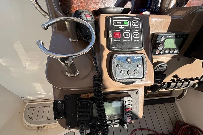 Slide: The Image of Control panel of a 2005 Regal Commodore 4260 boat with communication devices. - 6