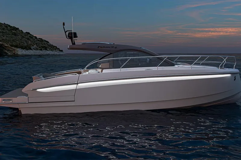 Slide: The Image of 2026 Beneteau Gran Turismo 40 yacht on clear blue water, showcasing sleek design and spacious deck. - 11