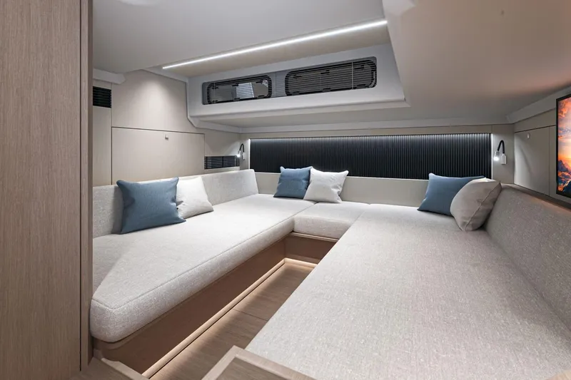 Slide: The Image of Luxurious cabin interior of 2026 Beneteau Gran Turismo 40 yacht, featuring modern design and cozy bedding. - 18