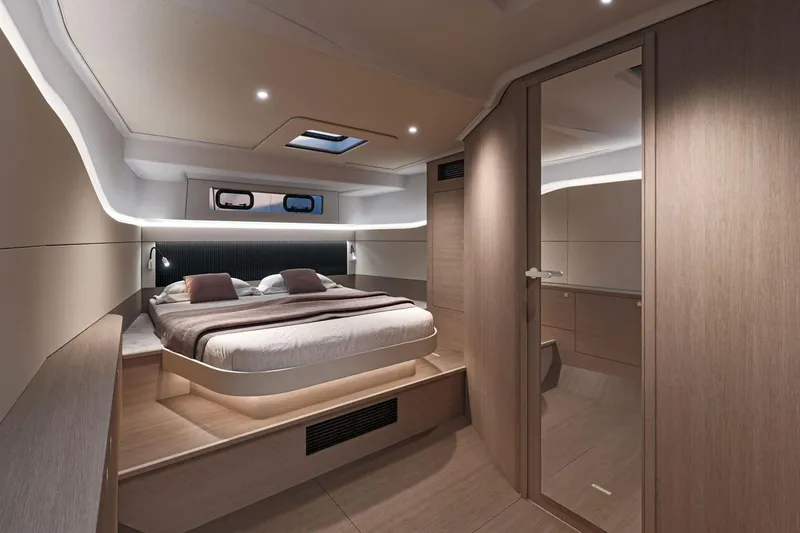 Slide: The Image of Luxurious interior of 2026 Beneteau Gran Turismo 40 yacht bedroom with modern design. - 19