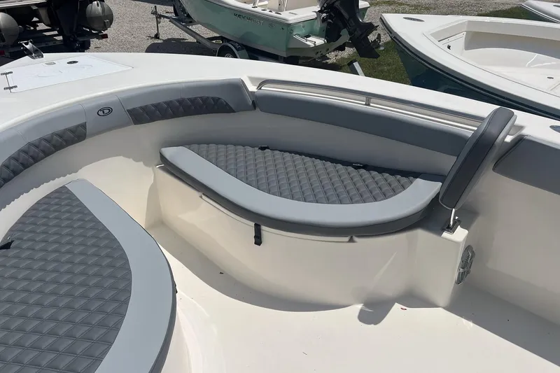 Slide: The Image of 2026 Defiance Catalina 240 boat interior with cushioned seating and modern design. - 20