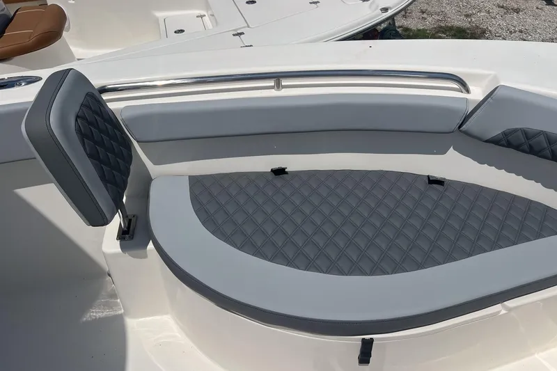Slide: The Image of 2026 Defiance Catalina 240 boat seating with gray diamond-pattern upholstery. - 23