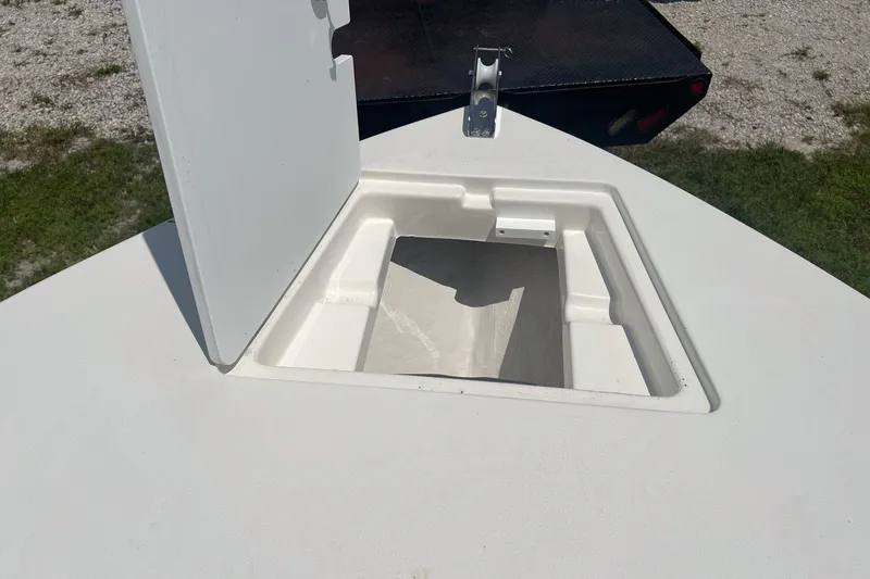 Slide: The Image of Open storage compartment on 2026 Defiance Catalina 240 boat deck. - 25