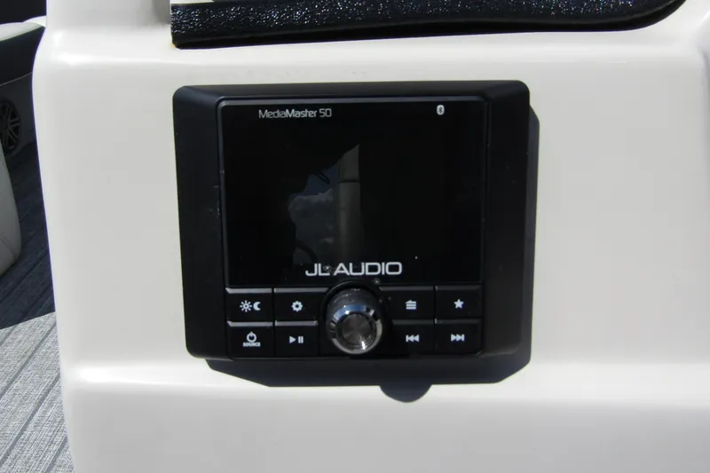 Slide: The Image of JL Audio MediaMaster 50 on 2021 Starcraft SLS 1 boat dashboard. - 17