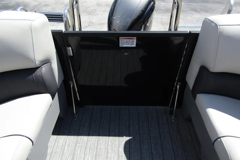 Slide: The Image of 2021 Starcraft SLS 1 boat interior with comfortable seating and safety gate. - 24