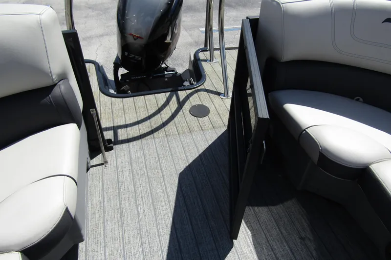 Slide: The Image of Interior view of 2021 Starcraft SLS 1 boat with seating and motor. - 25