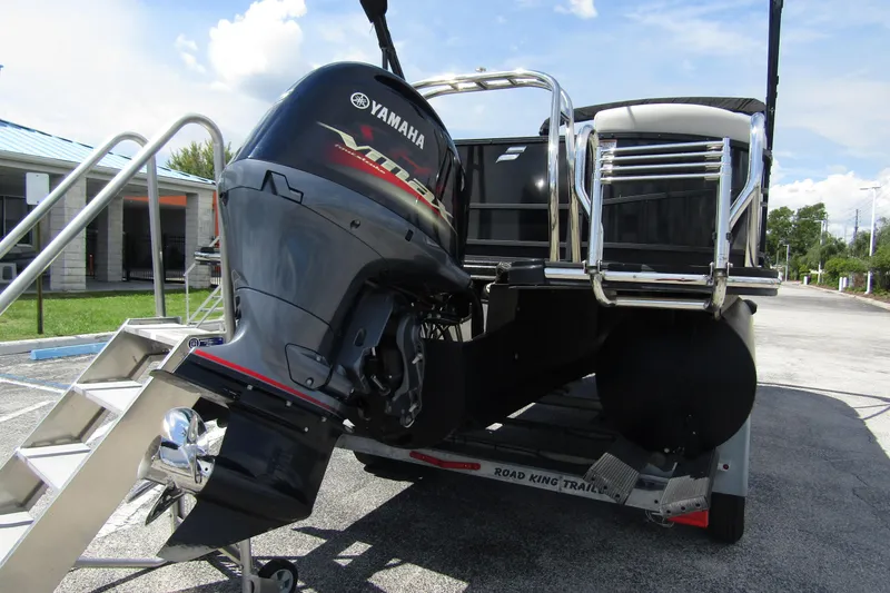 Slide: The Image of 2021 Starcraft SLS 1 boat with Yamaha outboard motor on trailer. - 4