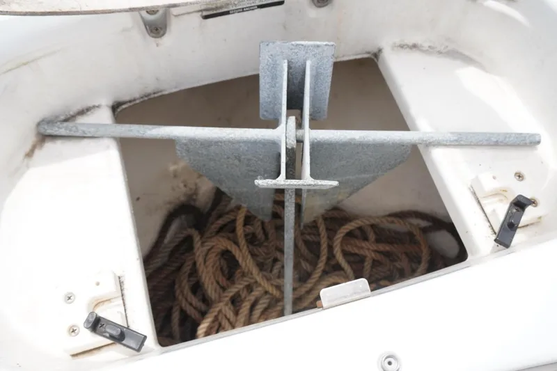 Slide: The Image of Anchor and rope storage on a 2003 Chaparral 230 SSi boat. - 43