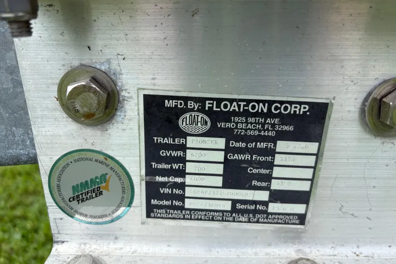 Slide: The Image of Label on a Float-On Corp trailer, showing specifications and certification details. - 55