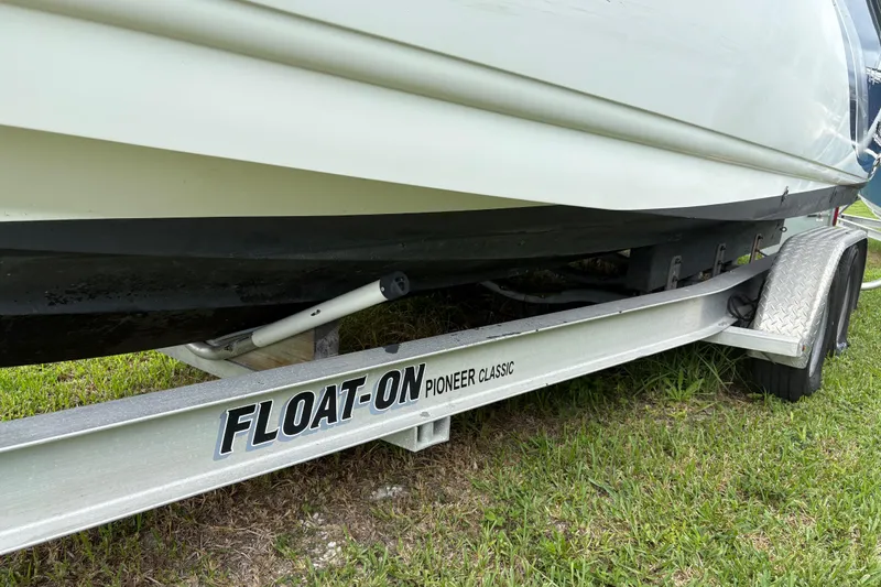 Slide: The Image of 2003 Chaparral 230 SSi boat on a Float-On Pioneer Classic trailer. - 56