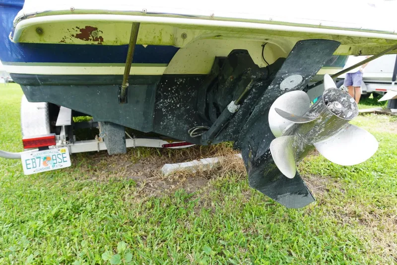 Slide: The Image of 2003 Chaparral 230 SSi boat propeller and stern on a trailer. - 61