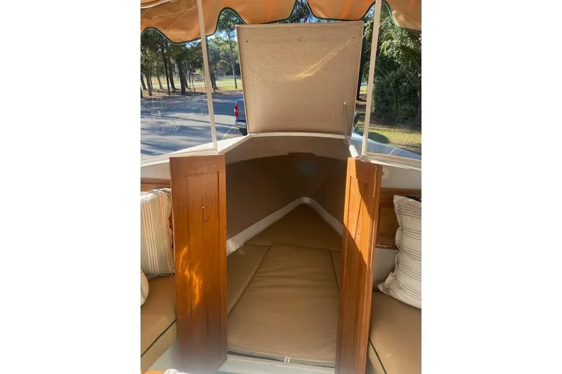 Slide: The Image of 2007 Duffy 22' Cuddy Cabin interior with open hatch and seating area. - 8