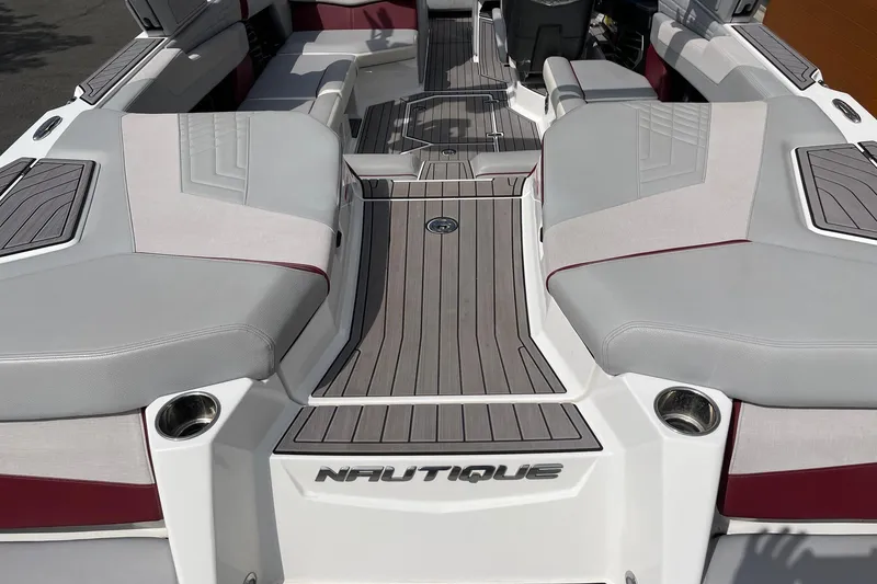 Slide: The Image of 2023 Nautique Super Air Nautique G23 boat interior with sleek seating and modern design. - 4