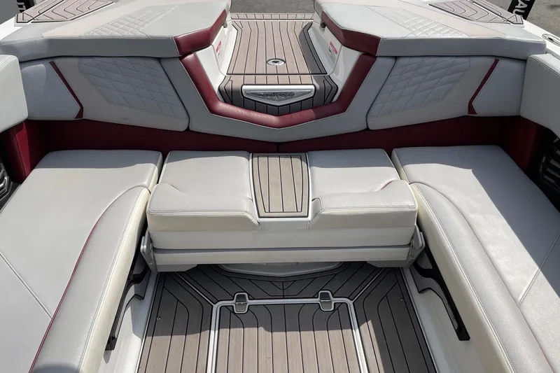 Slide: The Image of 2023 Nautique Super Air Nautique G23 interior with luxurious seating and stylish design. - 8