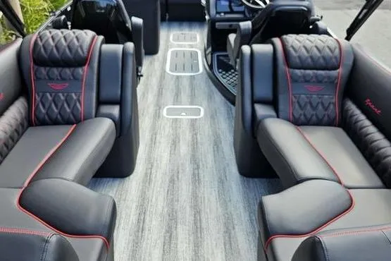 Slide: The Image of Luxurious interior of 2026 Bennington 23 RFB boat with plush seating and modern design. - 10