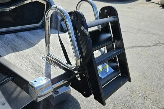 Slide: The Image of Stainless steel ladder on 2026 Bennington 23 RFB boat, docked on a sunny day. - 12