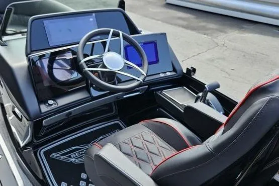Slide: The Image of Interior of 2026 Bennington 23 RFB boat with modern dashboard and steering wheel. - 8
