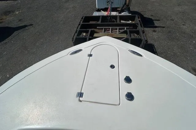 Slide: The Image of Interior of 2021 Tidewater 320 CC Adventure boat with control panel and countertop. - 24