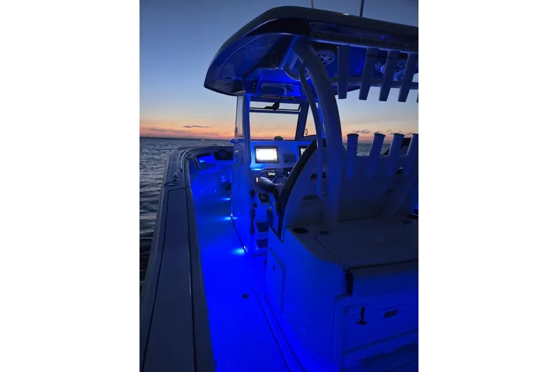 Slide: The Image of 2021 Tidewater 320 CC Adventure cabin interior with cushioned seating and storage nets. - 27